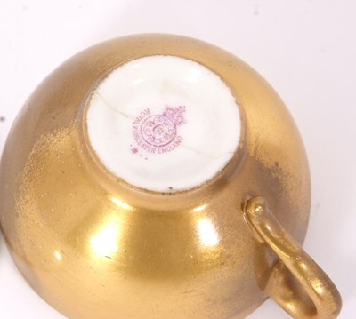 Lot 21 - A miniature Worcester porcelain cup and saucer...
