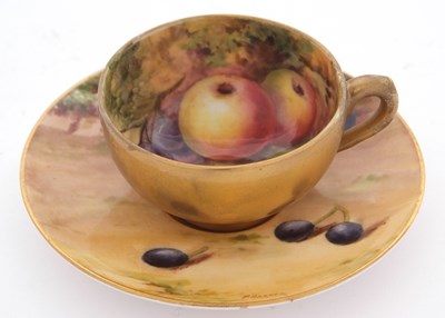 Lot 21 - A miniature Worcester porcelain cup and saucer...
