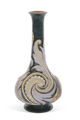 Lot 45 - A Lambeth Doulton vase of pear shape decorated...