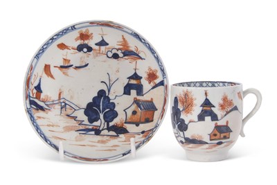 Lot 70 - A Lowestoft porcelain cup and saucer decorated...