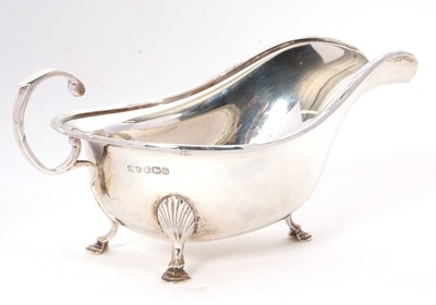 Lot 6 - A George V silver sauce boat of typical form...