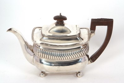 Lot 37 - A George III silver teapot of oval form having...