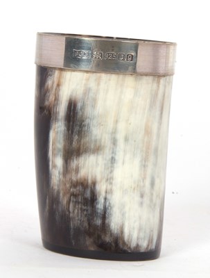 Lot 42 - A horn beaker with a hallmarked silver rim,...