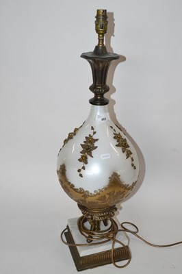 Lot 574 - An unusual 20th Century table lamp base, the...