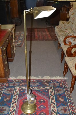 Lot 479 - A 20th Century brass floor standing bankers...