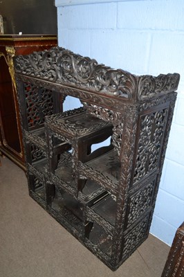 Lot 502 - An unusual Chinese hardwood display stand of...