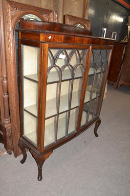 Lot 506 - An Edwardian mahogany bow front china display...