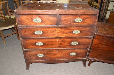 Lot 517 - A Georgian mahogany chest with two short over...