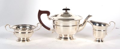 Lot 73 - An Art Deco three piece silver tea service...