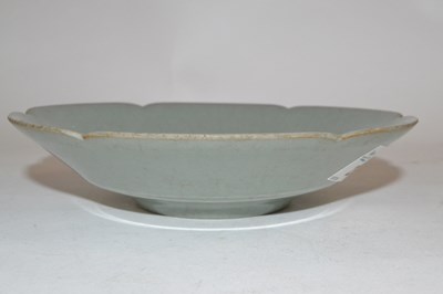 Lot 272 - A Chinese celadon dish of petal shape possibly...