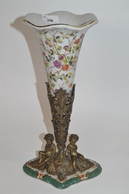 Lot 256 - A large porcelain vase of trumpet shape in a...