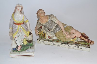 Lot 279 - A Staffordshire group with a soldier on...
