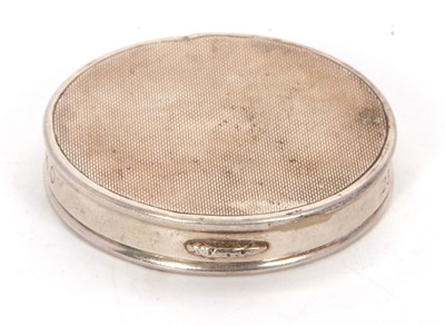 Lot 79 - A hallmarked silver ladies compact of circular...