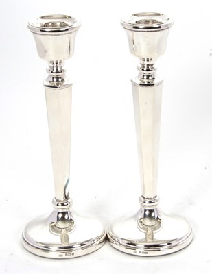 Lot 106 - A pair of silver hallmarked candlesticks...