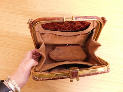 Lot 124 - A brown leather moc-croc patent leather...