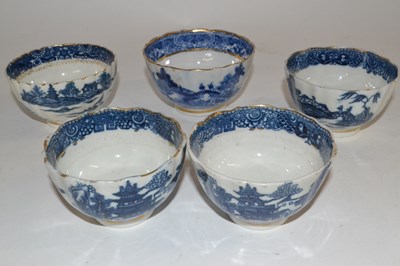 Lot 353 - Group of five Caughley tea bowls with blue and...