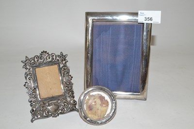 Lot 356 - A silver photo frame together with two smaller...