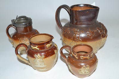 Lot 365 - A group of Doulton Harvest ware jugs together...