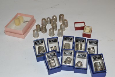 Lot 375 - A group of boxed silver thimbles