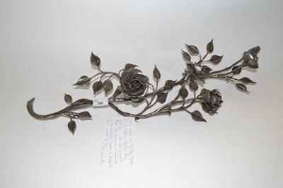 Lot 389 - A silvered branch of roses with hand forged by...