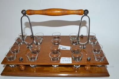 Lot 393 - An oak tray containing a quantity of communion...