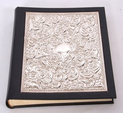 Lot 377 - Silver fronted and leather bound address book...