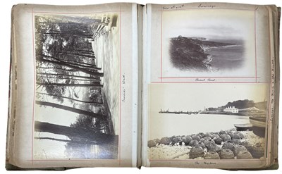 Lot 452 - A pair of late 19th century photograph albums...