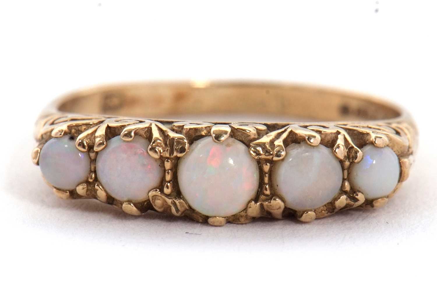 Lot 20 - A 9ct opal ring, set with five graduated round...