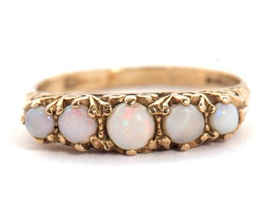 Lot 20 - A 9ct opal ring, set with five graduated round...