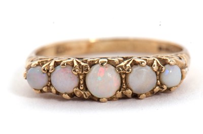 Lot 20 - A 9ct opal ring, set with five graduated round...