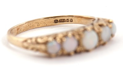 Lot 20 - A 9ct opal ring, set with five graduated round...