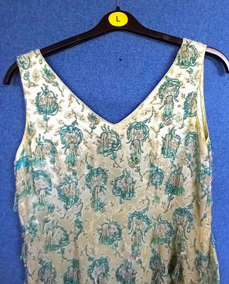 Lot 39 - A mid 20th century blue beaded shift dress and...