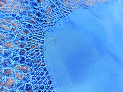 Lot 7 - A late 19th/early 20th century blue silk...