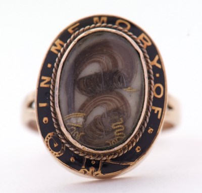 Lot 36 - A 19th century mourning ring, the oval glazed...