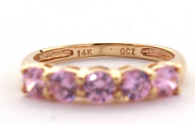 Lot 71 - A 14ct pink CZ ring, set with five round pink...