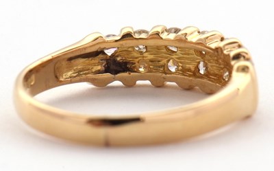 Lot 72 - A diamond ring, the upper half set with small...