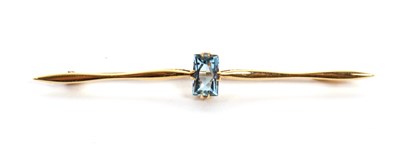 Lot 118 - A 15ct aquamarine bar brooch, the mixed cut...