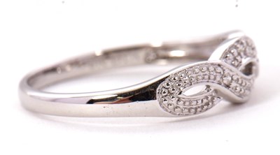 Lot 70 - A 9ct diamond ring, the upper half set with...