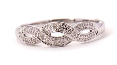 Lot 70 - A 9ct diamond ring, the upper half set with...