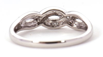 Lot 70 - A 9ct diamond ring, the upper half set with...