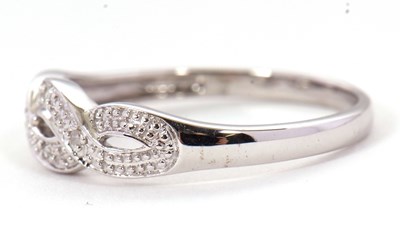Lot 70 - A 9ct diamond ring, the upper half set with...