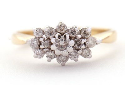 Lot 68 - A diamond cluster ring, set with round...