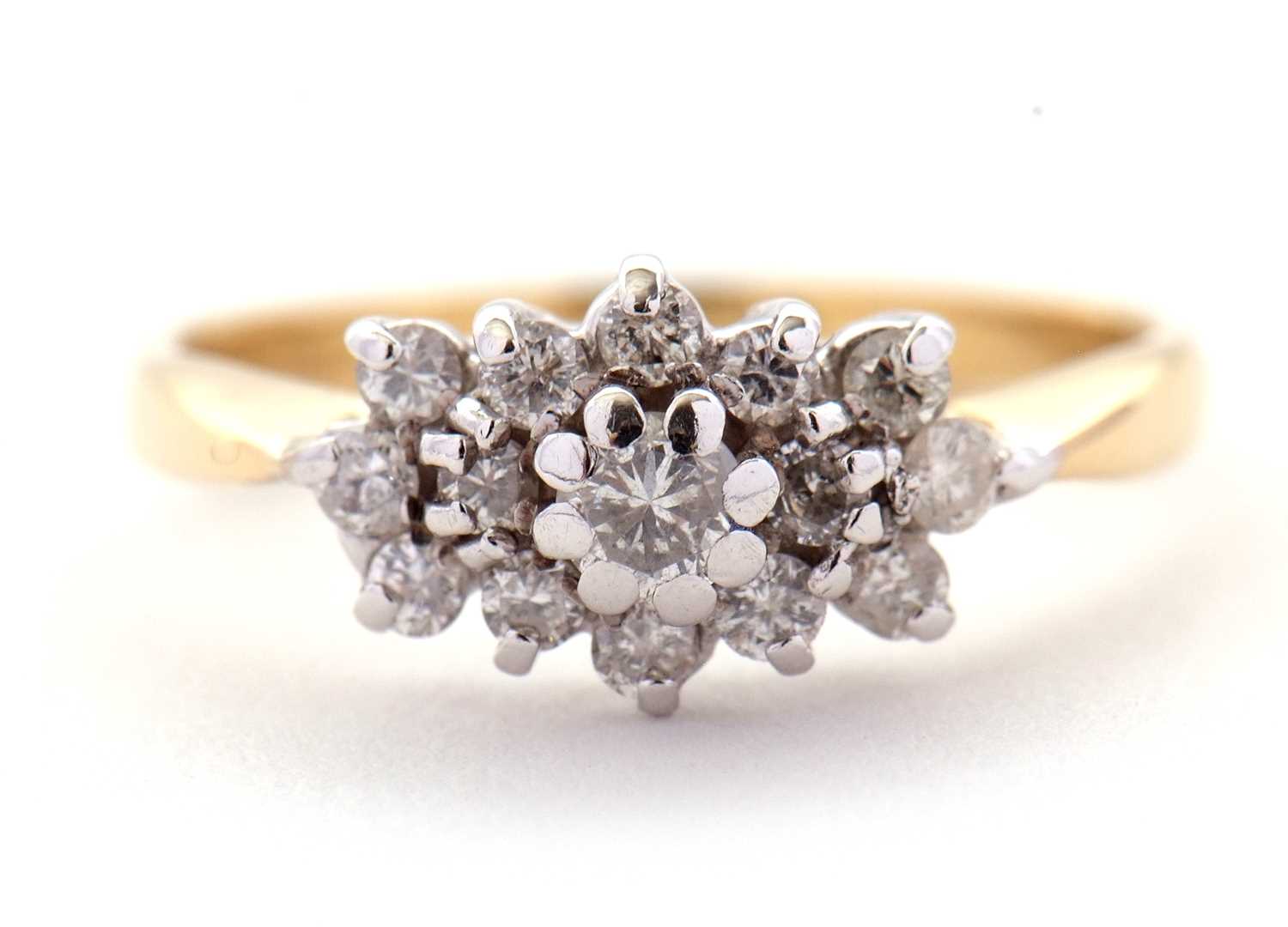 Lot 68 - A diamond cluster ring, set with round...