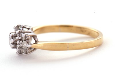Lot 68 - A diamond cluster ring, set with round...