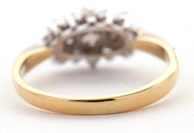 Lot 68 - A diamond cluster ring, set with round...