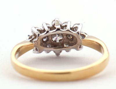 Lot 68 - A diamond cluster ring, set with round...