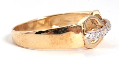 Lot 78 - A diamond ring, set with two circles crossed...