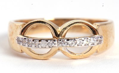 Lot 78 - A diamond ring, set with two circles crossed...