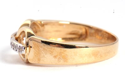 Lot 78 - A diamond ring, set with two circles crossed...