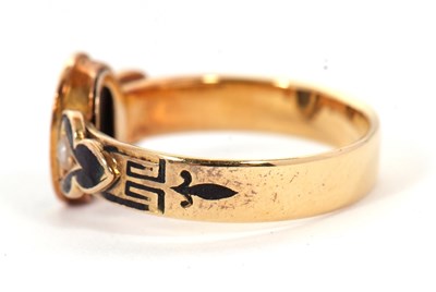 Lot 54 - A 19th century mourning ring, the central oval...